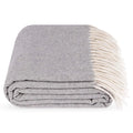 A folded grey polo cashmere and wool throw blanket with cream-colored fringe, shown on a clean white background.