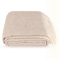A folded Steppe beige wool throw blanket with cream fringe, photographed on a clean white background.