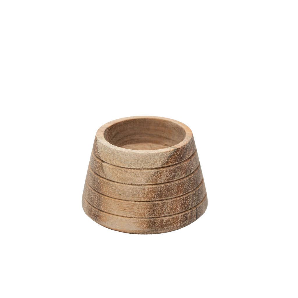 Hand-carved acacia wood tea light holder showing horizontal grooved detailing against a plain white background.