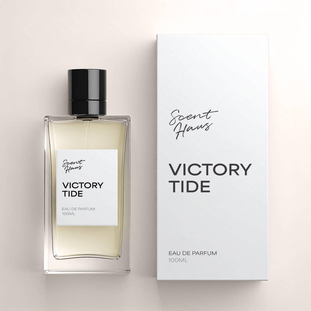 Perfume bottle and packaging of 'Victory Tide' by Scent Haus on a light background.